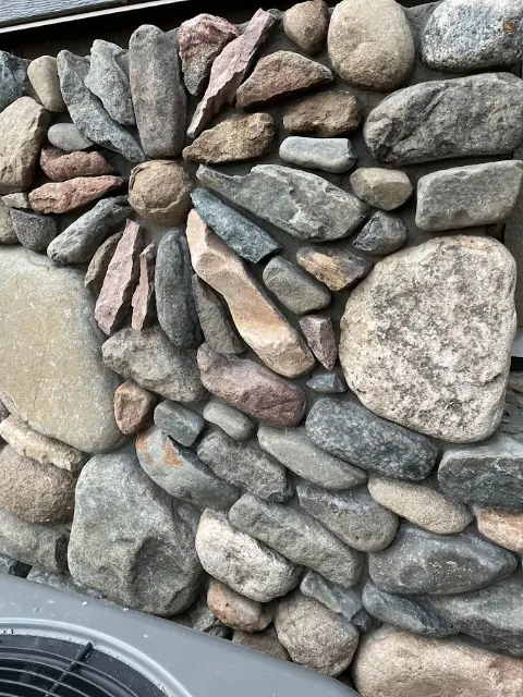 Decorative stone wall with unique pebble arrangement